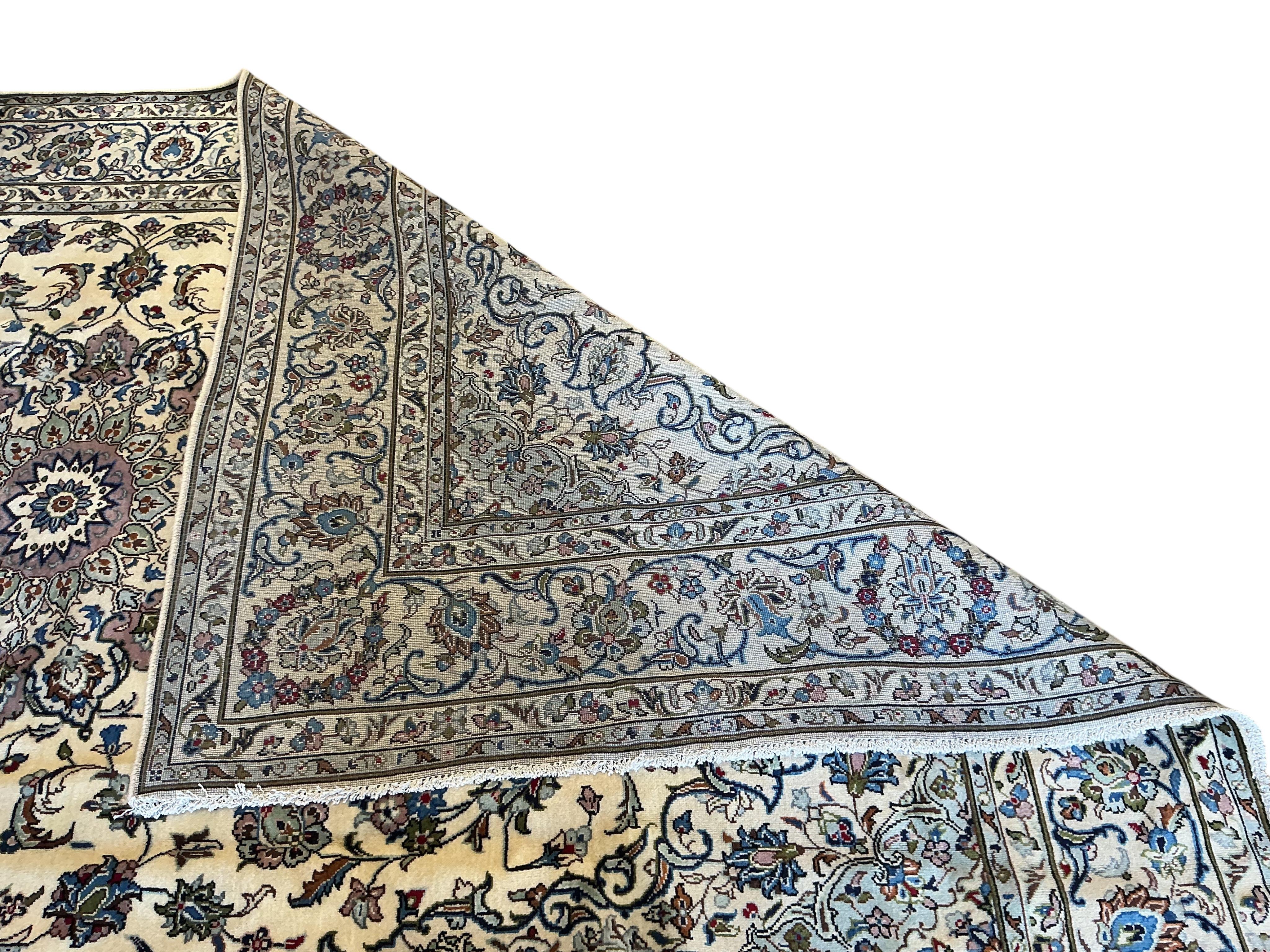 A Kashan pale blue ground carpet, 315 x 201cm